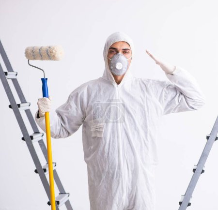 Photo for Painter working at the construction site - Royalty Free Image