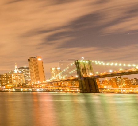 Photo for The night view of manhattan and brooklyn bridge - Royalty Free Image