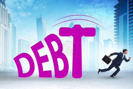 Photo for Heavy debt concept with the businessman - Royalty Free Image