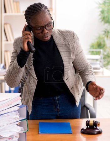 Photo for The black female lawyer in courthouse - Royalty Free Image