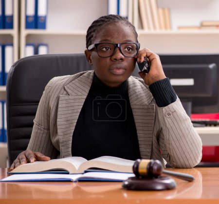 Photo for The black female lawyer in courthouse - Royalty Free Image