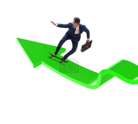 Photo for The businessman riding skateboard on financial graph - Royalty Free Image