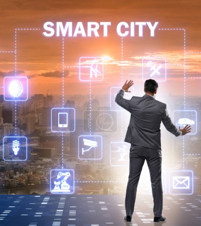 Photo for The concept of smart city with businessman pressing buttons - Royalty Free Image