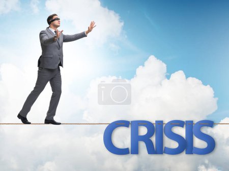 Photo for The crisis concept with businessman walking on tight rope - Royalty Free Image