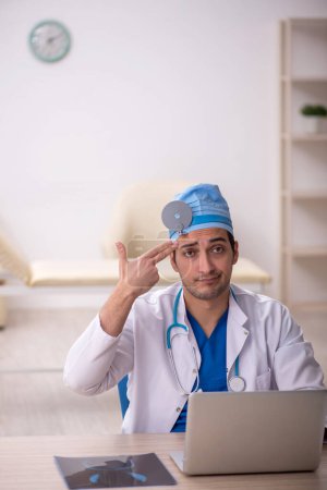 Photo for Young doctor otologist working at the hospital - Royalty Free Image