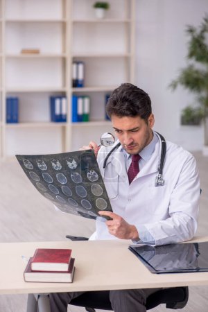 Photo for Young doctor radiologist working in the clinic - Royalty Free Image
