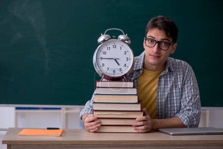Photo for Young student in time management concept - Royalty Free Image