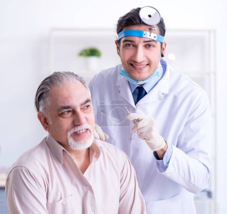 Photo for The male patient visiting doctor otolaryngologist - Royalty Free Image