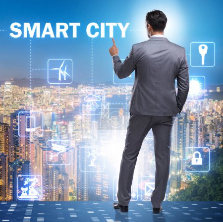 Photo for The concept of smart city with businessman pressing buttons - Royalty Free Image