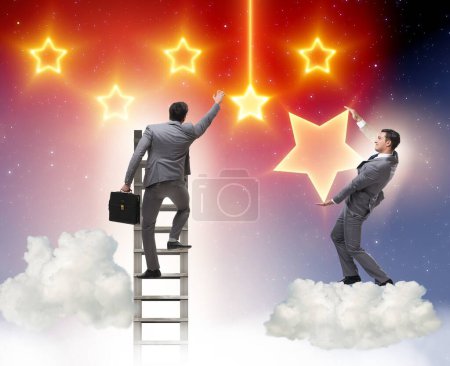 Photo for The businessman reaching out for stars - Royalty Free Image