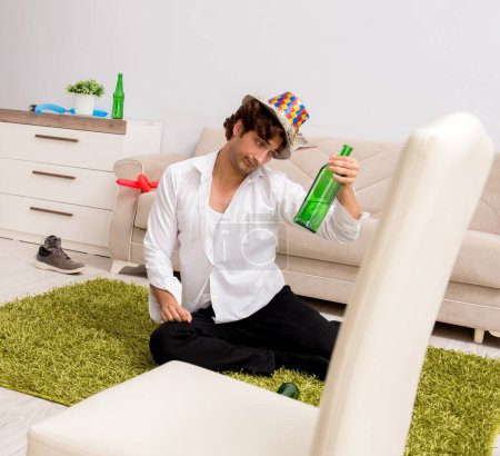 Photo for The young man having hangover after party - Royalty Free Image