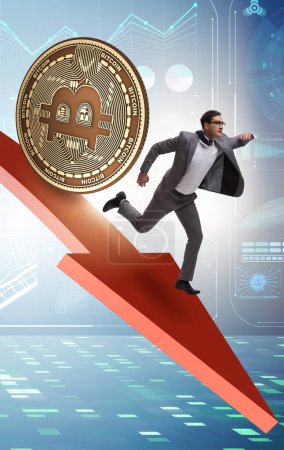 Foto de El bitcoin persiguiendo a hombre de negocios en criptomoneda caída del precio - Imagen libre de derechos