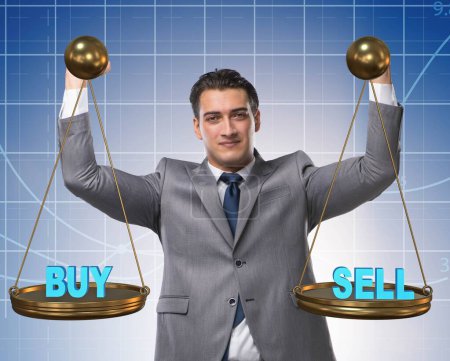 Photo for The businessman choosing between buying and selling - Royalty Free Image
