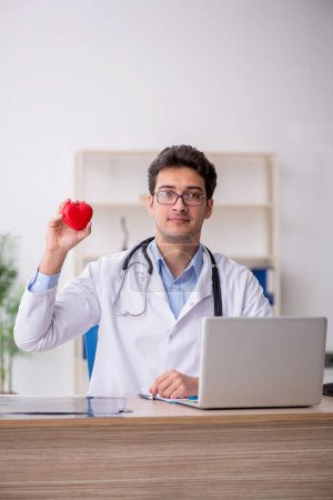 Photo for Young doctor cardiologist working at the hospital - Royalty Free Image