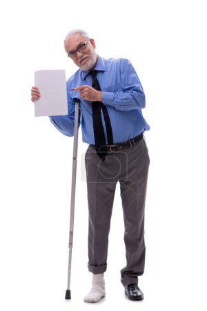 Photo for Old male boss with crutches isolated on white - Royalty Free Image