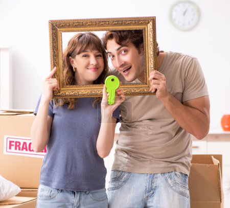 Photo for The young pair moving to new appartment - Royalty Free Image