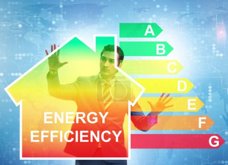 Téléchargez les photos : Le concept d'homme d'affaires en efficacité énergétique - en image libre de droit