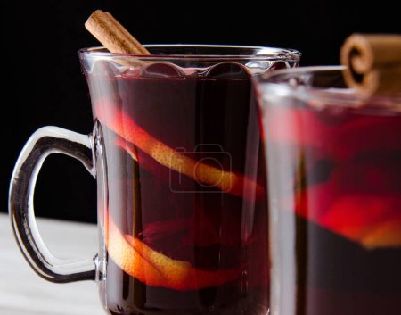 Photo for The mulled wine glintwine served in glasses for christmas table - Royalty Free Image