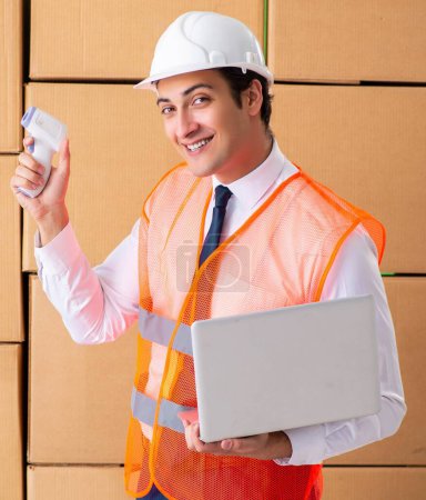 Photo for The man contractor working in box delivery relocation service - Royalty Free Image