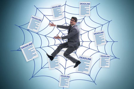 Photo for Businessman caught in web of deadlines - Royalty Free Image