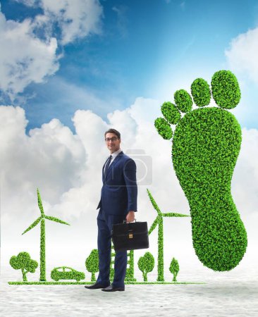 Photo for The carbon footprint concept with businessman - Royalty Free Image
