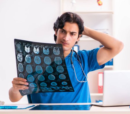 Photo for The young male doctor radiologist working at the clinic - Royalty Free Image