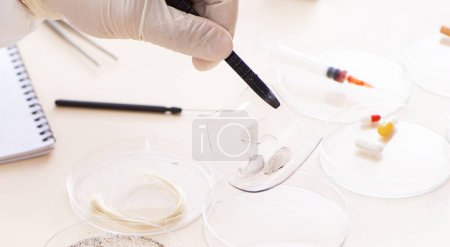 Photo for The young expert criminologist working in the lab - Royalty Free Image