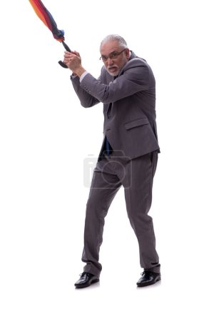 Foto de Viejo jefe masculino sosteniendo un umrella aislado en blanco - Imagen libre de derechos