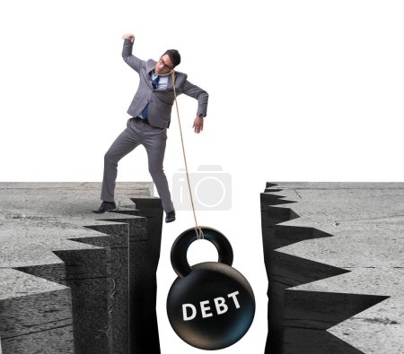 Téléchargez les photos : Le concept de dette et de charge avec l'homme d'affaires - en image libre de droit