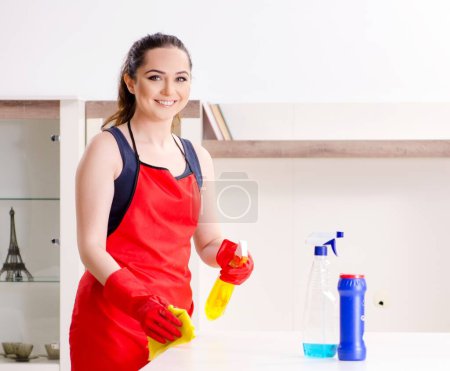 Photo for The young beautiful woman cleaning apartment - Royalty Free Image