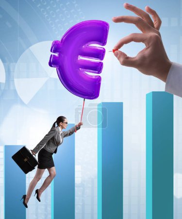 Photo for The businesswoman flying on euro sign inflatable balloon - Royalty Free Image