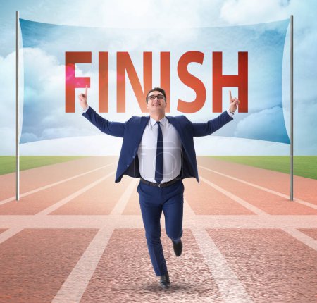 Photo for The businessman on the finishing line in competition concept - Royalty Free Image