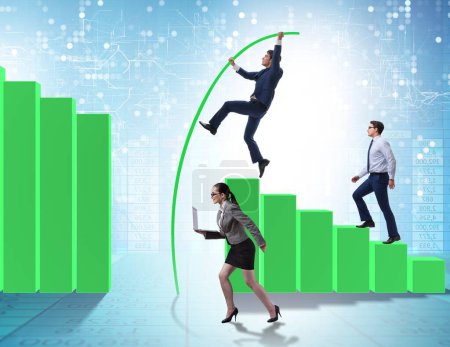Photo for The business people vault jumping over bar charts - Royalty Free Image