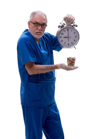 Photo for Old doctor in time management concept isolated on white - Royalty Free Image