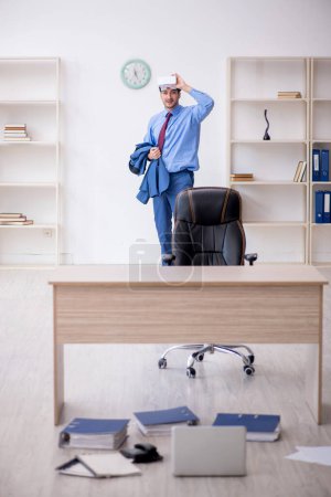 Photo for Young employee enjoying virtual glasses at workplace - Royalty Free Image