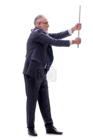 Foto de Hombre de negocios envejecido sosteniendo palo de metal aislado en blanco - Imagen libre de derechos