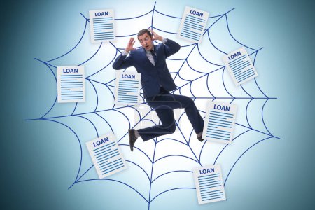 Photo for Businessman caught in debt and loan - Royalty Free Image