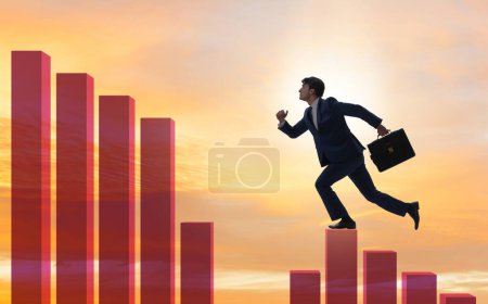 Photo for The businessman climbing bar charts in growth concept - Royalty Free Image