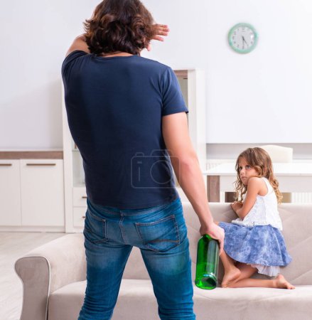 Photo for The drunk father in domestic child abuse and violence concept - Royalty Free Image