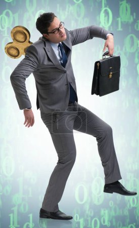 Téléchargez les photos : L'homme d'affaires avec la clé dans le concept travailleur - en image libre de droit