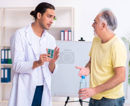 Photo for The doctor dietician giving advices to fat overweight patient - Royalty Free Image