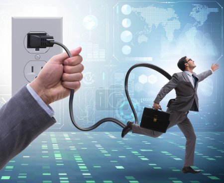 Photo for The businessman being powered by electricity and plug - Royalty Free Image