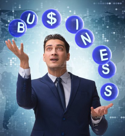 Photo for The businessman juggling between various priorities in business - Royalty Free Image