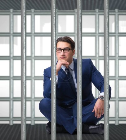 Téléchargez les photos : L'homme d'affaires dans la cage concept d'entreprise - en image libre de droit