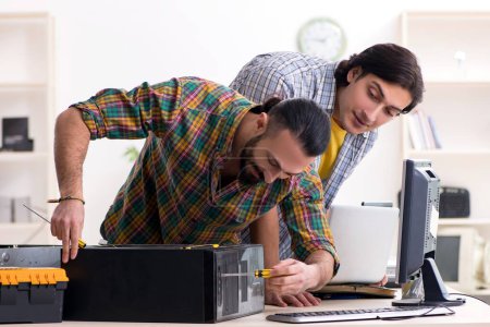 Photo for The it engineers working on hardware issue - Royalty Free Image