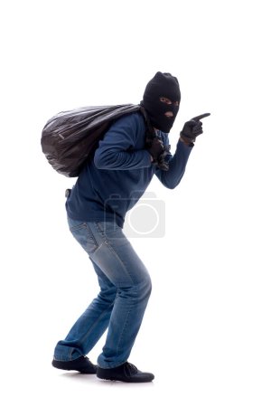 Photo for Young burglar stealing money isolated on white - Royalty Free Image