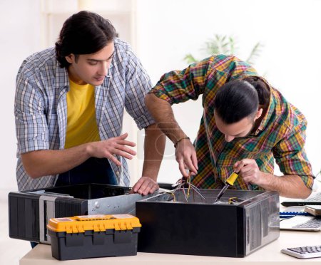 Photo for The it engineers working on hardware issue - Royalty Free Image