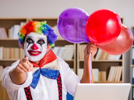 Photo for The clown businessman working in the office - Royalty Free Image