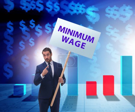 Foto de El concepto de salario mínimo con empresario - Imagen libre de derechos