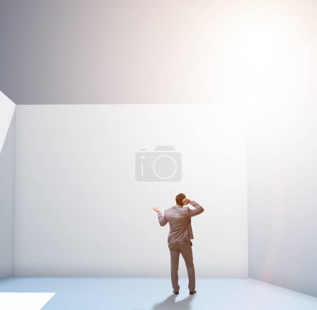 Photo for The businessman trying to escape from difficult situation - Royalty Free Image